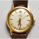 A GENTLEMAN'S ROAMER WRISTWATCH with leather strap.