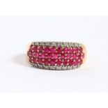 A 9CT GOLD, RUBY AND DIAMOND RING.