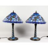 A PAIR OF TIFFANY STYLE DRAGONFLY TABLE LAMPS. 23ins high.
