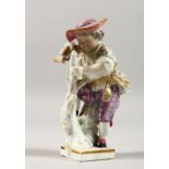 A 19TH CENTURY MEISSEN PORCELAIN FIGURE OF A YOUNG BOY, carving a tree stump, on a square base. 4ins