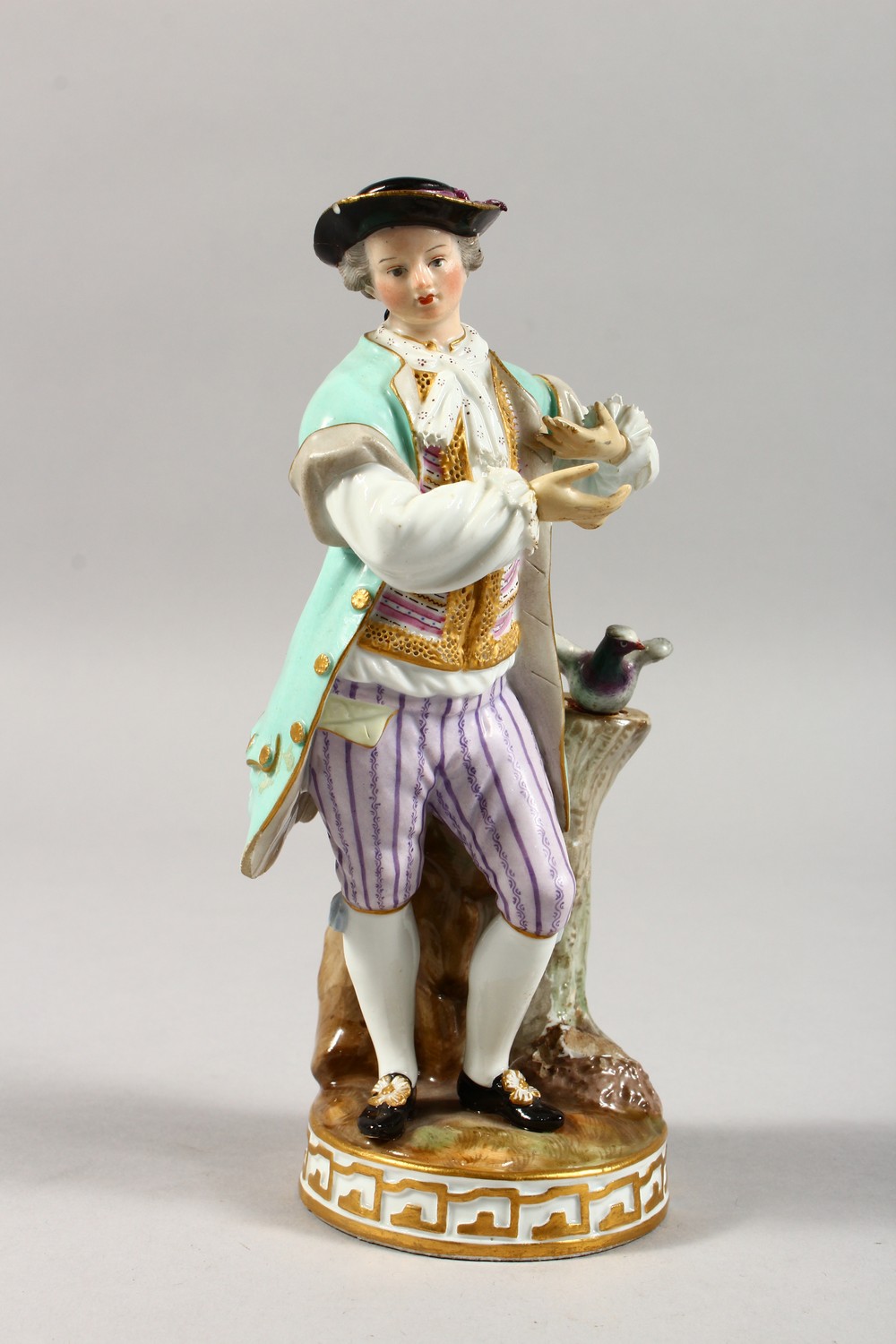 A 19TH CENTURY MEISSEN PORCELAIN FIGURE OF A GALLANT, standing beside a tree stump with a pigeon. - Image 2 of 17