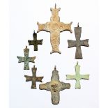 SEVEN VARIOUS ROMAN METAL CRUCIFIXES.