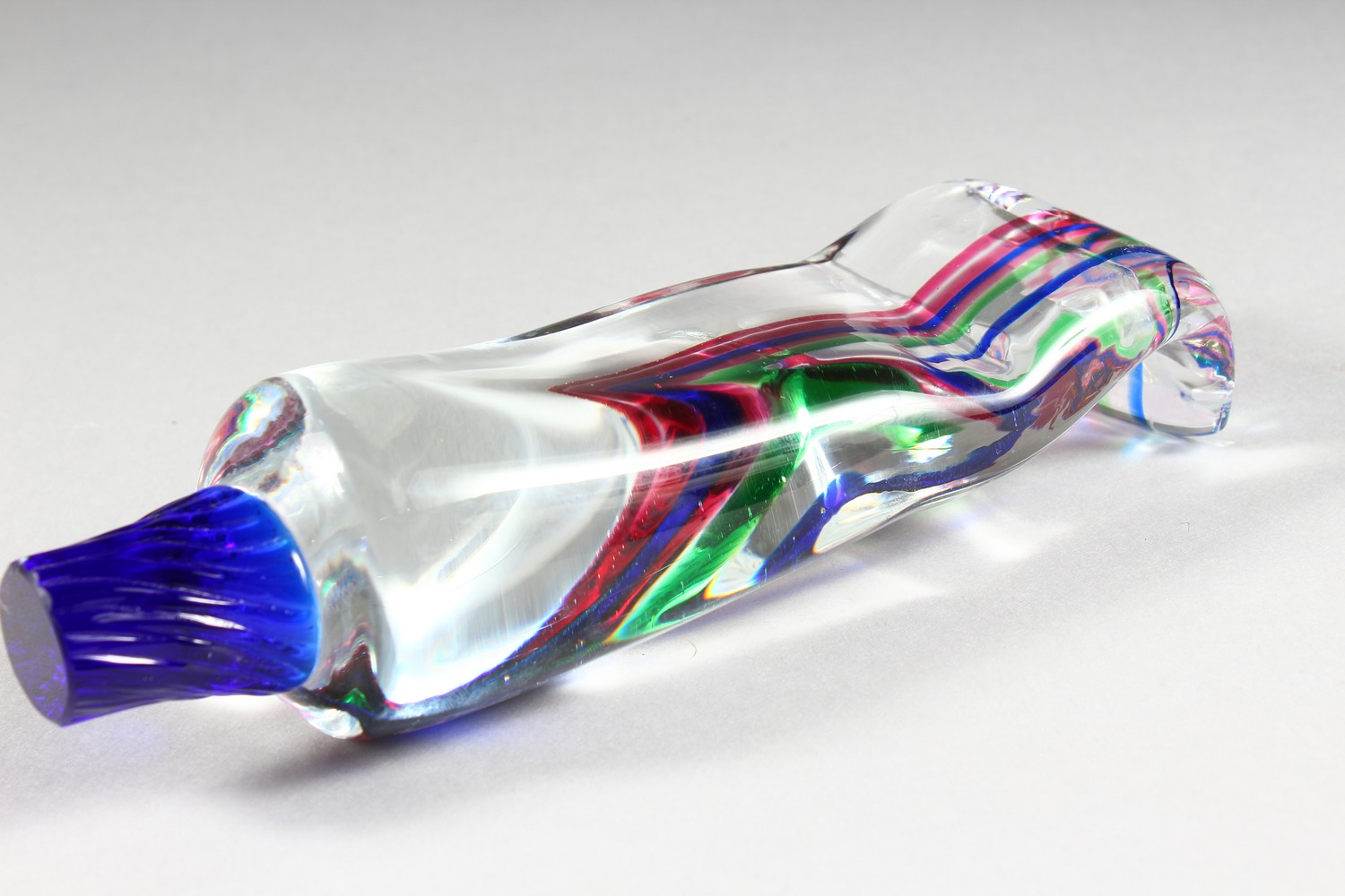 A MULTI-COLOURED STRIPED GLASS TOOTHPASTE TUBE. 8ins long. - Image 4 of 5