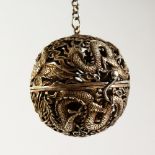 A PIERCED SILVER DRAGON BALL CENSER. 2.25ins diameter.