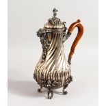A SUPERB 19TH CENTURY FRENCH .800 SILVER COFFEE POT with cast silver masks and mounts with wooden