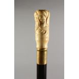 A BONE HANDLED WALKING STICK, carved as a bust of a man. 36ins long.