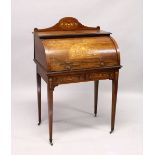 AN EDWARDIAN ROSEWOOD AND MARQUETRY CYLINDER BUREAU, with pull-out writing surface, two small