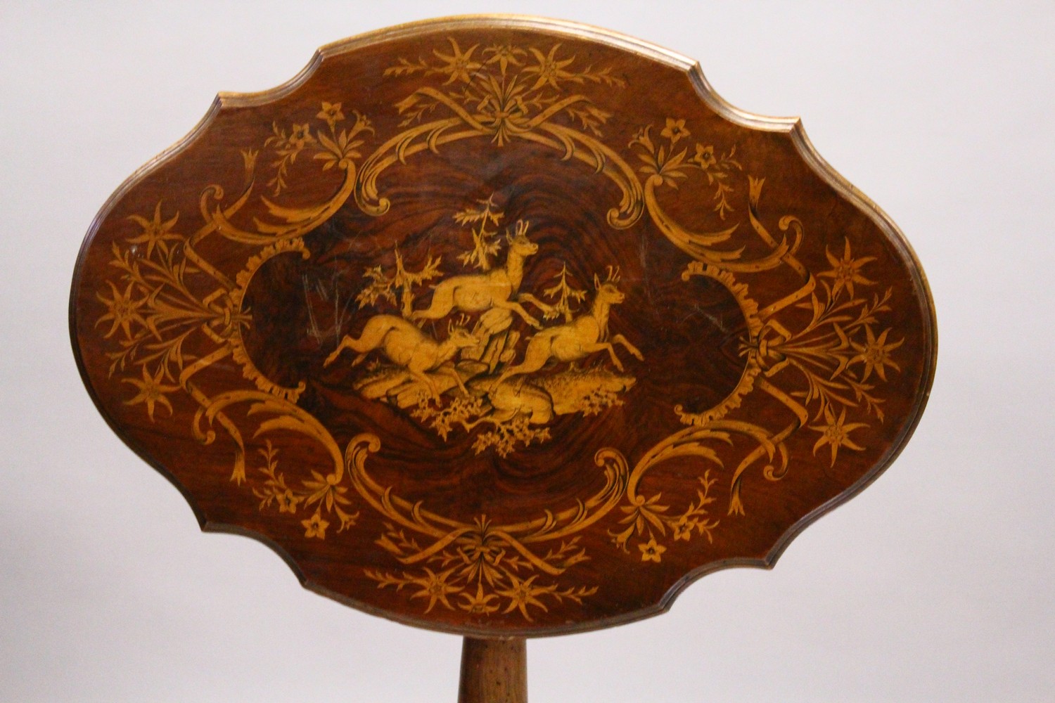 A "BLACK FOREST" WALNUT AND MARQUETRY TRIPOD TABLE, the shaped top inlaid with a scene of mountain - Image 2 of 7