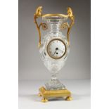 A SUPERB FRENCH CRYSTAL AND ORMOLU URN SHAPED CLOCK, with white enamel dial and ormolu mounts. 16.