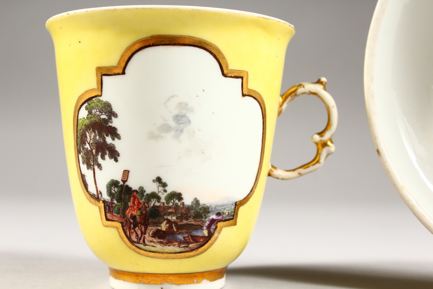 A SUPERB 18TH CENTURY MEISSEN CUP AND SAUCER, with yellow ground, the cup painted with two landscape - Image 4 of 13