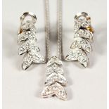 AN 18CT GOLD AND DIAMOND FOUR-TIER PENDANT, CHAIN and MATCHING EARRINGS.