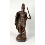 A GOOD, LARGE BRONZE FIGURE OF A ROMAN SOLDIER, on a circular marble base. 27.5ins high.