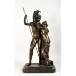 A CLASSICAL STYLE BRONZE GROUP, a nude male gladiator with a semi nude female stood at his side.