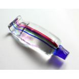 A MULTI-COLOURED STRIPED GLASS TOOTHPASTE TUBE. 8ins long.