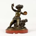 CLODION A GOOD SMALL BRONZE OF A CHERUB, with cymbals, on a marble base. Signed. 6ins high.