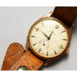 A GENTLEMAN'S LICA WRISTWATCH with leather strap.