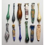 A COLLECTION OF TWELVE ROMAN/EGYPTIAN-STYLE DECORATIVE GLASS PIECES.