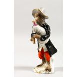 A 19TH CENTURY CONTINENTAL PORCELAIN FIGURE OF A MONKEY playing a bagpipe. Mark in blue. 5.5ins