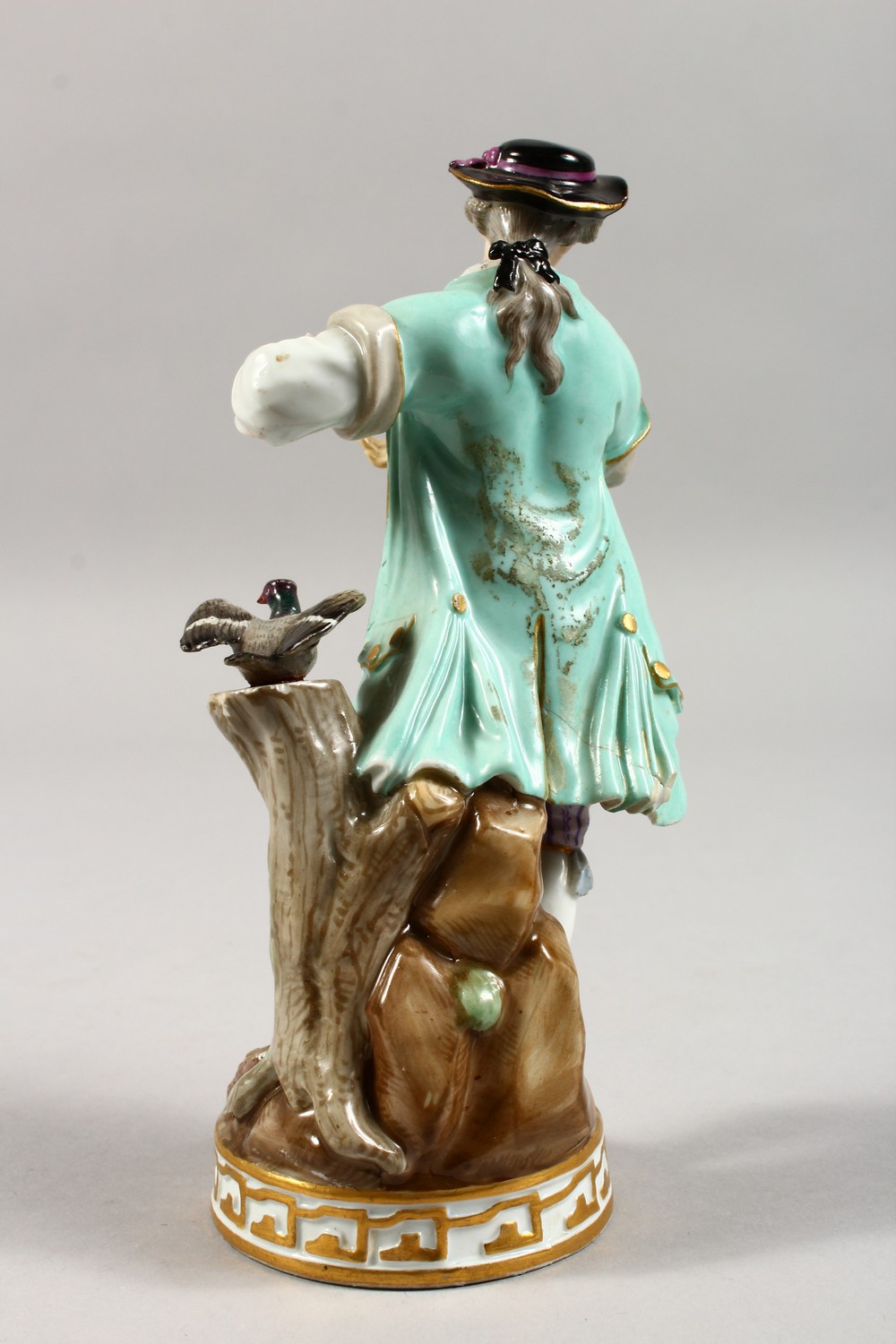 A 19TH CENTURY MEISSEN PORCELAIN FIGURE OF A GALLANT, standing beside a tree stump with a pigeon. - Image 4 of 17