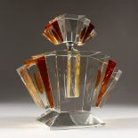 AN ART DECO STYLE AMBER AND CLEAR GLASS SCENT BOTTLE. 9ins wide.