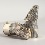 A PAIR OF .800 SILVER HORSES HEAD SALT AND PEPPERS. 2.75ins high.