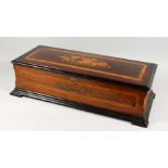 A LARGE VICTORIAN ROSEWOOD CASED MUSIC BOX, with 13-inch cylinder. Case: 30ins wide.