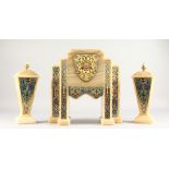A SUPERB ART DECO ONYX AND CHAMPLEVE ENAMEL THREE PIECE CLOCK SET, with eight-day movement, striking