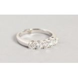 AN 18CT WHITE GOLD FIVE STONE DIAMOND RING of 1.2cts.