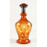 A BOHEMIAN AMBER ENGRAVED SCENT BOTTLE AND STOPPER, with silver band.