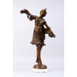 A GOOD ART DECO BRONZE DANCER, on a white circular marble base. 17ins high.