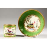 A GOOD 19TH CENTURY SEVRES COFFEE CAN AND SAUCER, apple green ground, edged in gilt and painted with