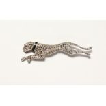 A SILVER ART DECO DESIGN MARCASITE PANTHER BROOCH.