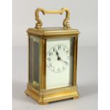 A 19TH CENTURY FRENCH BRASS TIMEPIECE CARRIAGE CLOCK. 4.5ins high.