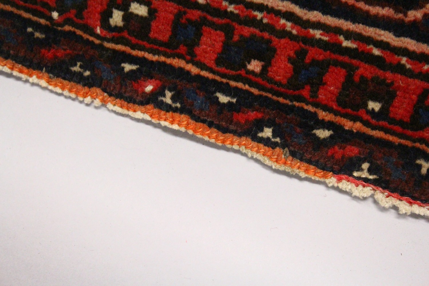 A PERSIAN RUG, 20TH CENTURY, red ground with central medallion, within a dark blue border. 6ft - Image 4 of 11