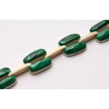 AN ART DECO MALACHITE AND BONE BRACELET. 8ins long.