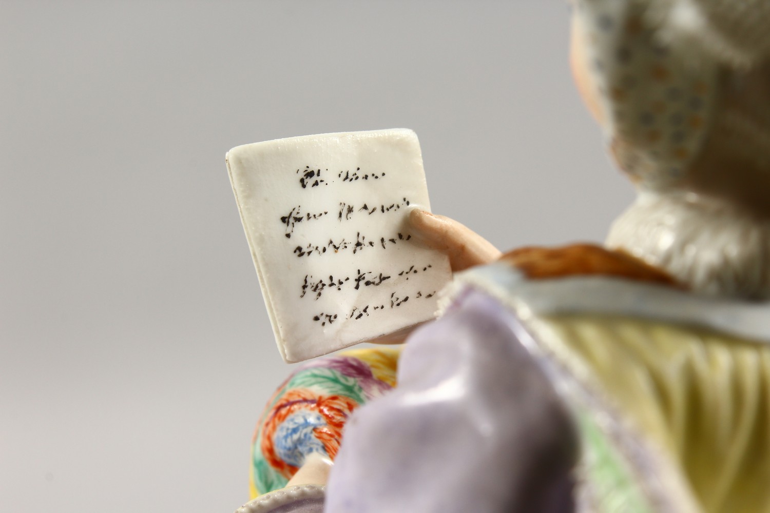 A GOOD 19TH CENTURY MEISSEN PORCELAIN FIGURE OF A LADY with muff, reading a book. Cross swords - Image 12 of 14