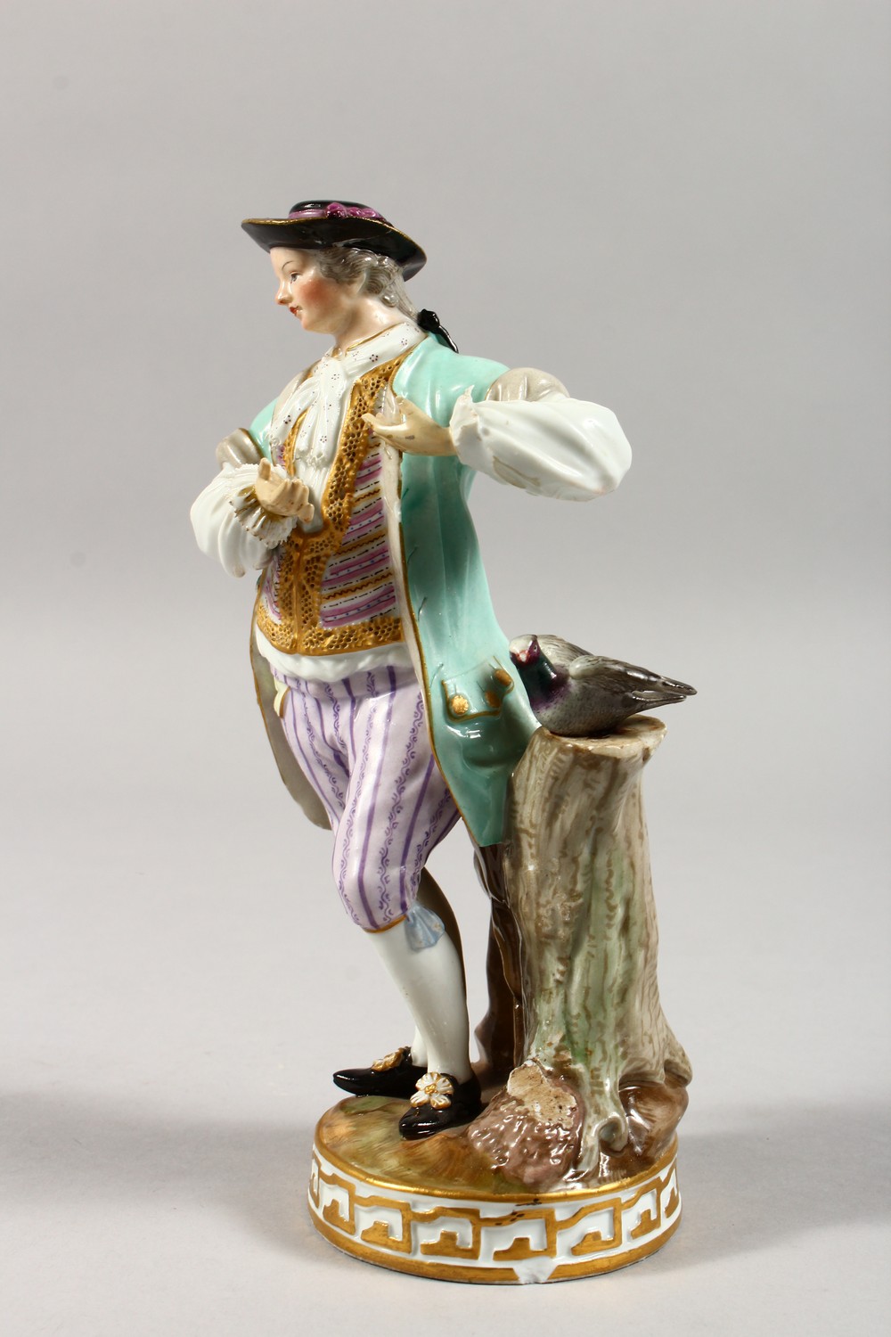 A 19TH CENTURY MEISSEN PORCELAIN FIGURE OF A GALLANT, standing beside a tree stump with a pigeon. - Image 3 of 17