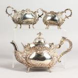 A SCOTTISH THREE PIECE TEA SET, with lovely repousse decoration and scrolls
