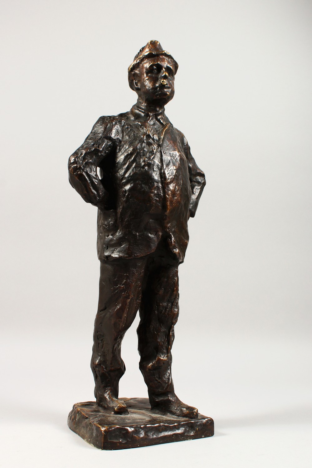 PRINCE PAOLO TROUBETZKOY (1866-1938) RUSSIAN. A GOOD CAST BRONZE OF A MAN standing hands on hips,