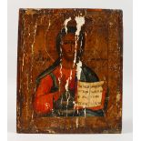 A PAINTED RUSSIAN ICON OF A SAINT. 12.5ins x 10.5ins.