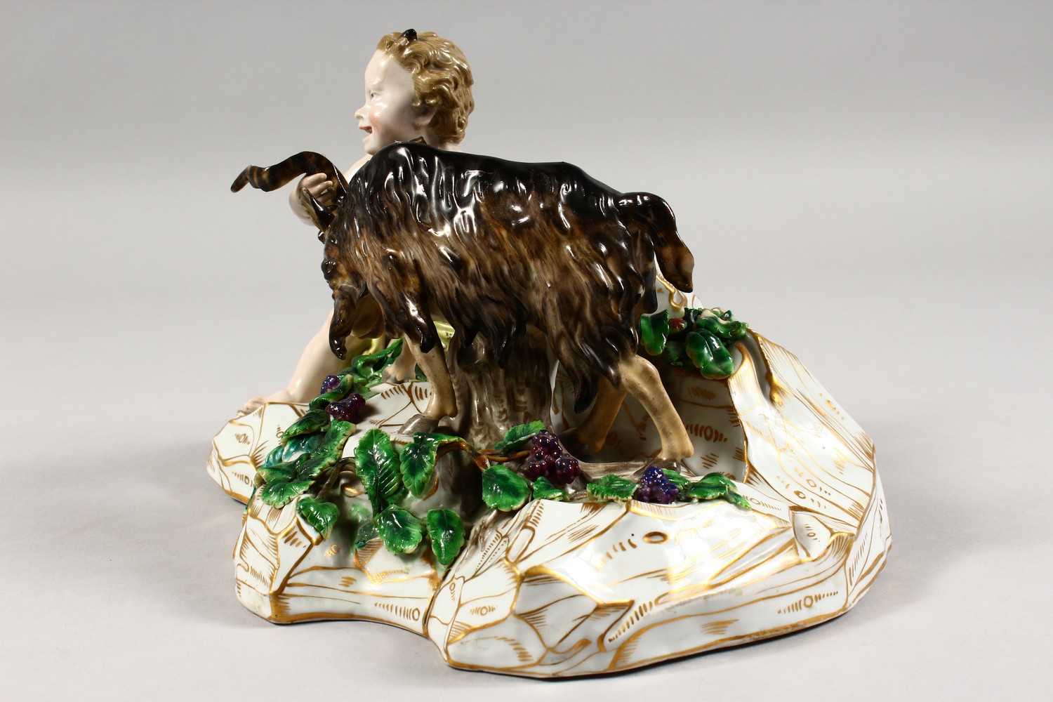 A GOOD MEISSEN PORCELAIN GROUP of a faun wrestling with a goat, on a gilt encrusted base. Incised - Image 3 of 8