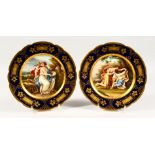 A SUPERB PAIR OF 19TH CENTURY VIENNA PLATES, "SCHLAFENDE AMOR" and "AMOR BELEHIRT DI VENUS"