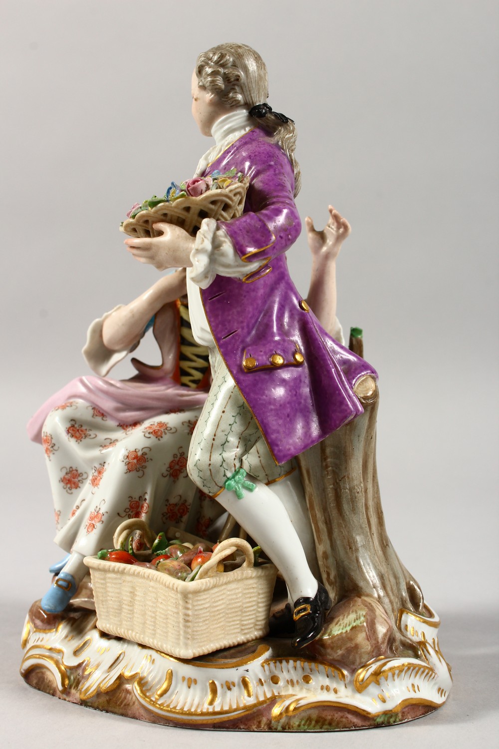 A 19TH CENTURY MEISSEN PORCELAIN GROUP OF A GALLANT AND LADY, with basket of fruit and flowers. - Image 6 of 8