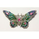 A LARGE SILVER BUTTERFLY BROOCH, set with ruby and enamels.