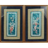 A PAIR OF CHINESE SILKWORK PICTURES OF FLOWERS, framed and glazed. 20.5ins x 13ins.