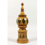 A PAINTED TUNBRIDGE WARE NUTMEG GRATER in the form of a Brighton Pavilion tower, the top unscrews to