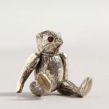 A NOVELTY SILVER TEDDY BEAR PIN CUSHION