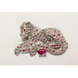 A SILVER PANTHER BROOCH, set with ruby and marcasite.