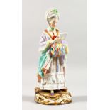 A GOOD 19TH CENTURY MEISSEN PORCELAIN FIGURE OF A LADY with muff, reading a book. Cross swords