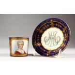 A GOOD 19TH CENTURY SEVRES CUP AND SAUCER, rich blue ground with gilt decoration and pearl work, and